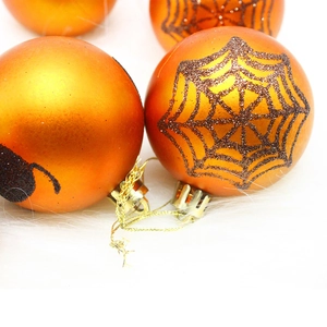 Orange Halloween window ornaments with black spiderweb and cat patterns, 12-pack plastic balls