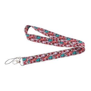 Detail of durable polyester lanyard with cartoon doctor prints and metal lobster clasp