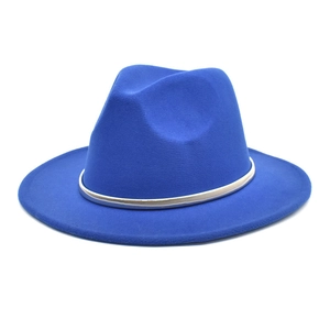 Close-up of royal blue wool fedora hat with a sleek silver metallic decorative band