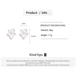 Detailed view of silver flower earrings with alloy material specs and size info