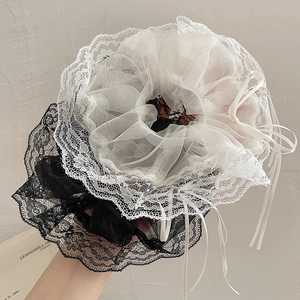 Lace scrunchies set in black and white with ribbon bows for ballet style hair decor