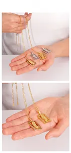 Macro view of square Virgin Mary pendants with colorful zircons on gold and silver chains