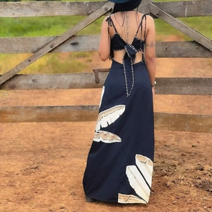 Women's backless maxi dress with white palm leaf print and tie back for summer beach vacations
