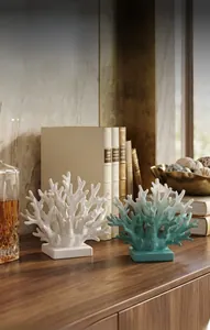 Detail of coral resin ornaments with bionic structure on a dark wooden bookshelf