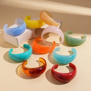 Colorful resin open bangle bracelet set with marbled texture in vibrant dopamine colors