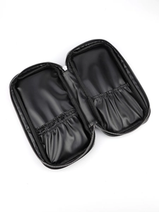 Detail of oversized PU makeup brush bag with elastic compartments and zipper