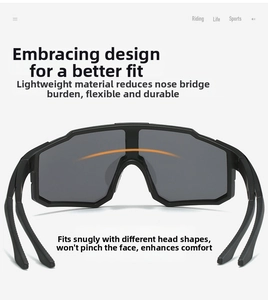 Detail of wraparound lightweight sports sunglasses with matte black frames and wide lenses