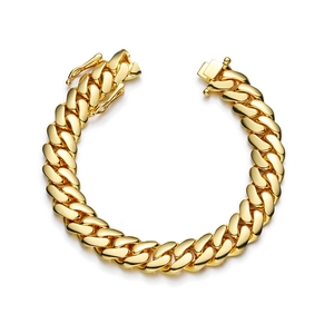 Detail of 18K gold plated Cuban link bracelet with high-shine finish and butterfly clasp