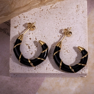 French vintage C-shaped hoop earrings with black enamel and gold spiral metal wrap detail