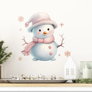 Christmas snowman wall sticker with pink hat and scarf on white wall in cozy living room decor