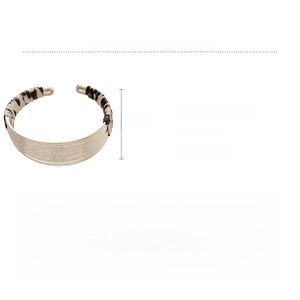 Detail view of leopard print faux leather and alloy layered open cuff with size specs