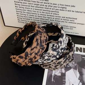 Braided leopard print and monochrome headband set for high-crown hairstyling