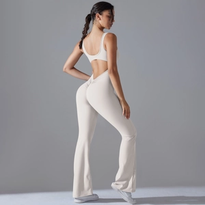 Detail showing backless cut and scrunch butt lifting design on cream yoga jumpsuit
