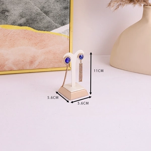Detail of 11cm beige PU leather T-bar earring stand showing dimensions and jewelry