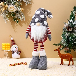 Close-up of Nordic Christmas gnome featuring grey polka dot hat and long white faux fur beard