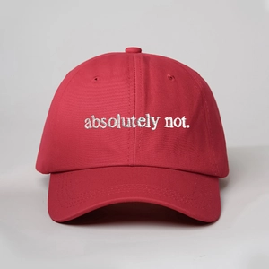 Close-up of red cotton baseball cap with white absolutely not embroidery detail