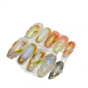 Handmade press-on nails with 3D tulip carvings, aurora powder, and pearl accents