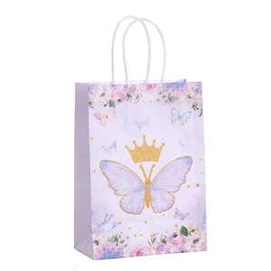 Lavender butterfly gift bag with crown print, white rope handles for party favors
