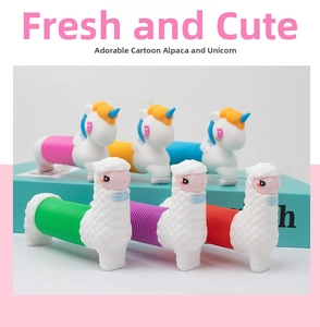 Detail of colorful pop tube toys featuring flexible bodies with unicorn and alpaca heads