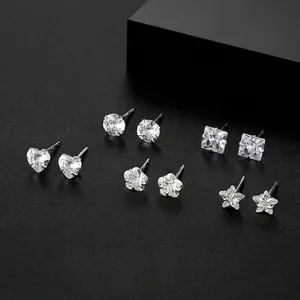 Set of 5 pairs of S999 silver stud earrings featuring heart, star, and flower shapes