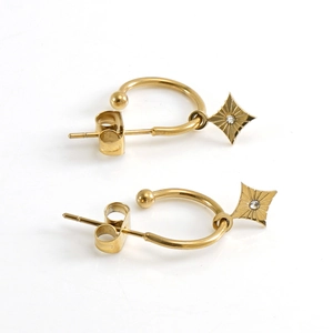 Boucles d'oreilles créoles dorées en acier avec étoiles et cristaux scintillants