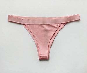Detail of light pink cotton panty showing soft knitted fabric and high-elastic waistband