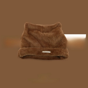 Close-up of brown faux mink knit hat with cute cat ears and metal brand tag detail