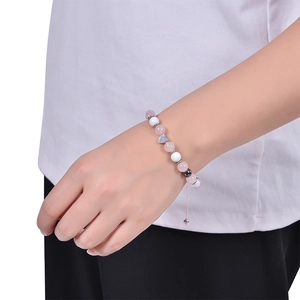 Pink crystal and agate beaded bracelet with silver heart pendant on a woven adjustable cord