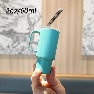 Detailed view of a mini 2oz bright blue stainless steel espresso tumbler with straw