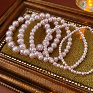 French vintage pale pink pearl bracelets set of five with varied bead sizes