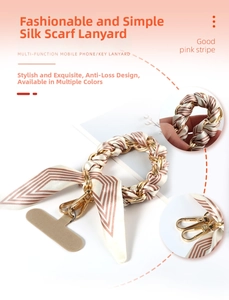 Pink silk fabric and gold chain braided phone lanyard with lobster clasp and gasket