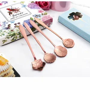 Detail of rose gold flower coffee spoons with sunflower and sakura embossed designs