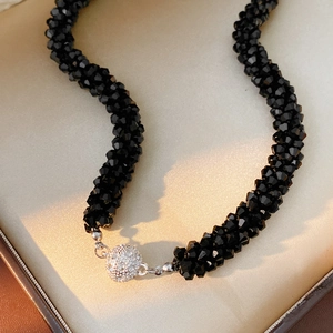 Elegant black beaded necklace with a crystal-encrusted magnetic ball clasp for women
