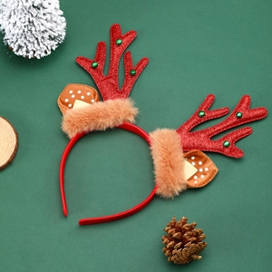 Serre-tête de Noël avec bois de renne à paillettes rouges et cloches sur fond de fête