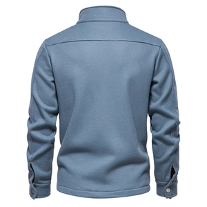 Rear view of men's blue waffle texture knit jacket featuring high collar and premium fabric
