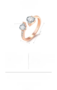 Detail of rose gold heart and drop shape ring with S925 engraving and cubic zirconia