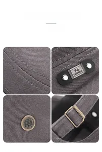 Detail of grey cotton flat cap featuring metal ventilation eyelets and FS logo plate