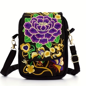 Ethnic style black crossbody mini bag featuring vibrant purple floral embroidery