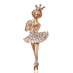Detailed view of ballet dancer brooch in rose gold with shimmering crystal accents