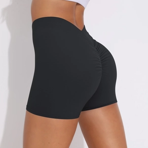 Detail view of high waisted scrunch butt yoga shorts in black stretch fabric