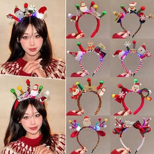 Detailed view of various glowing Christmas headbands featuring reindeer antlers and Santa