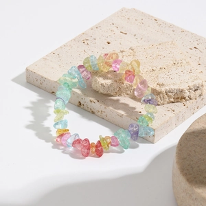 Detailed macro view of colorful bohemian natural stone chips on a textured stone base