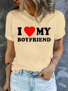 Women's apricot T-shirt with I Love My Boyfriend print paired with distressed denim jeans
