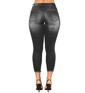 Rückansicht graue High-Waist Skinny Jeans mit verwaschener Optik und offenen Säumen