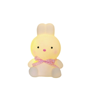 Cute glowing yellow bunny night light with pink checkered ribbon on a white background