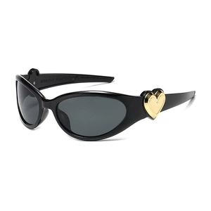 Y2K dopamine pink heart sunglasses in black frames with gold metallic heart accents