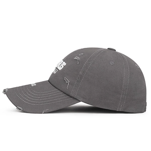 Distressed dark gray baseball cap with white letter embroidery and vintage torn details