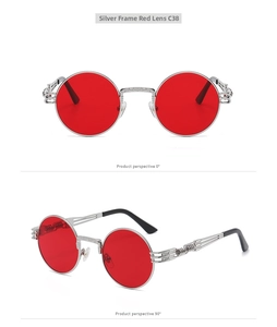 Macro view of silver metal steampunk sunglasses with red round lenses and spring temples