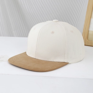 Close-up of kids hip hop cap showing contrast stitching and premium cotton canvas texture
