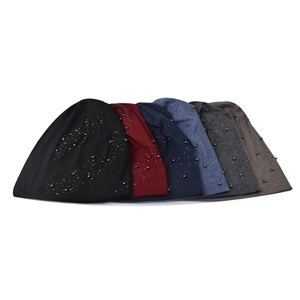 Soft knit beanies for women in six colors featuring stylish metallic bead decorations